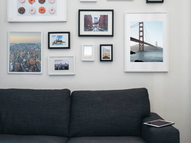 Home interior with sofa and paintings on the wall